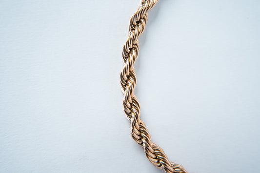 Combo ELYSIUM Cadena mas pulsera Lazo Rosa para caballero